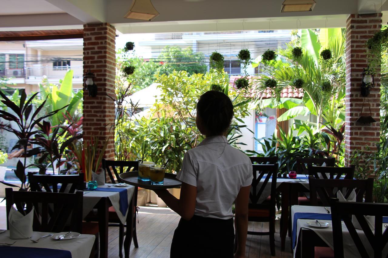 VMANSION Boutique Hotel Phnom Penh Extérieur photo