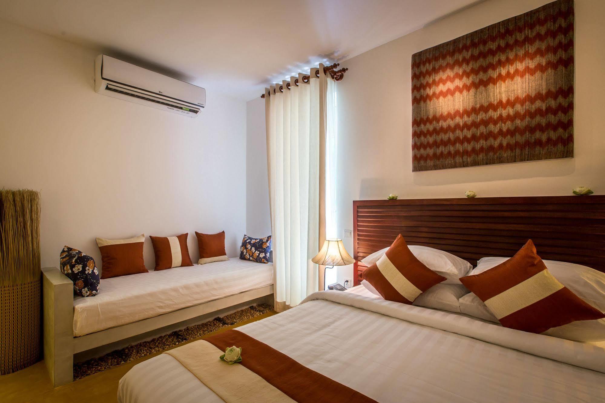 VMANSION Boutique Hotel Phnom Penh Extérieur photo